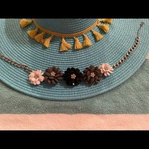 Grey, black, & white flower shape necklace. One size fits all. Its a casual look